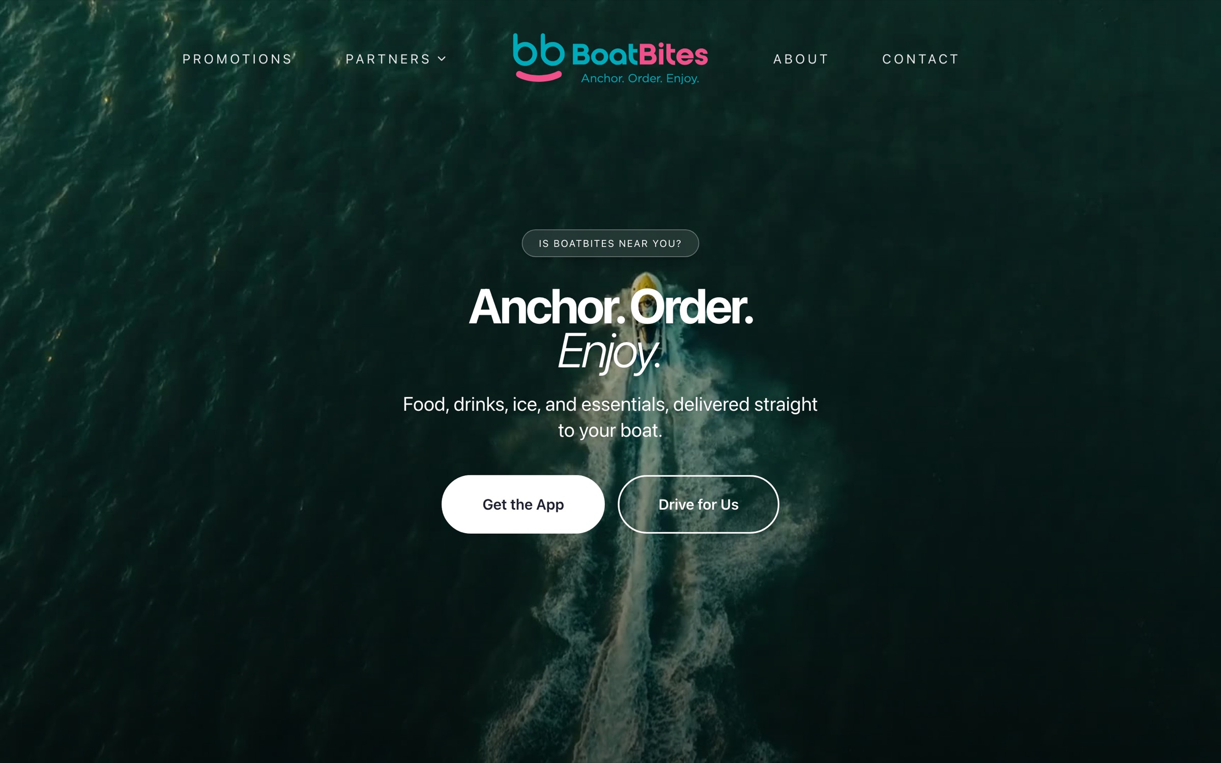 BoatBites homepage: a speedboat seen from above with the line Anchor. Order. Enjoy.